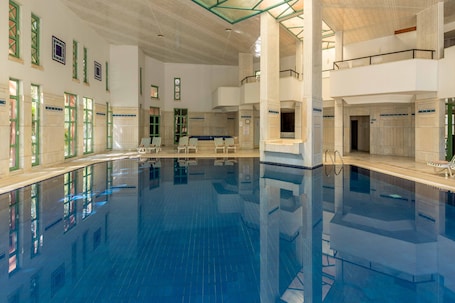 2 indoor pools, seasonal outdoor pool, pool umbrellas, sun loungers