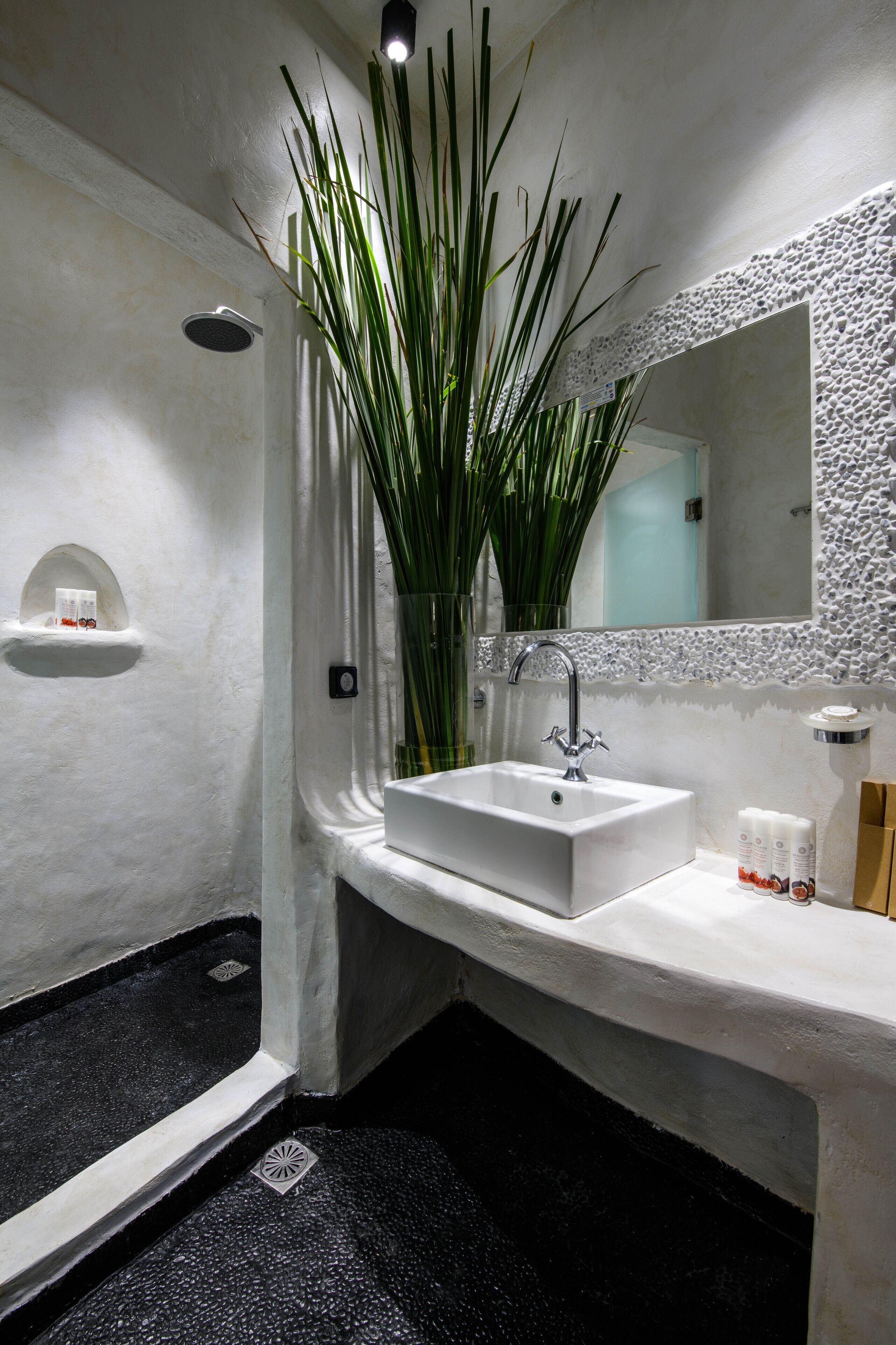 one bedroom suite with sea view | bathroom | shower, rainfall showerhead, free toiletries, hair dryer