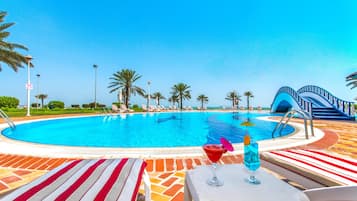 2 outdoor pools, pool umbrellas, pool loungers