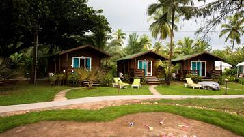 Relax in serene surroundings amidst lush greenery and tranquil atmosphere.