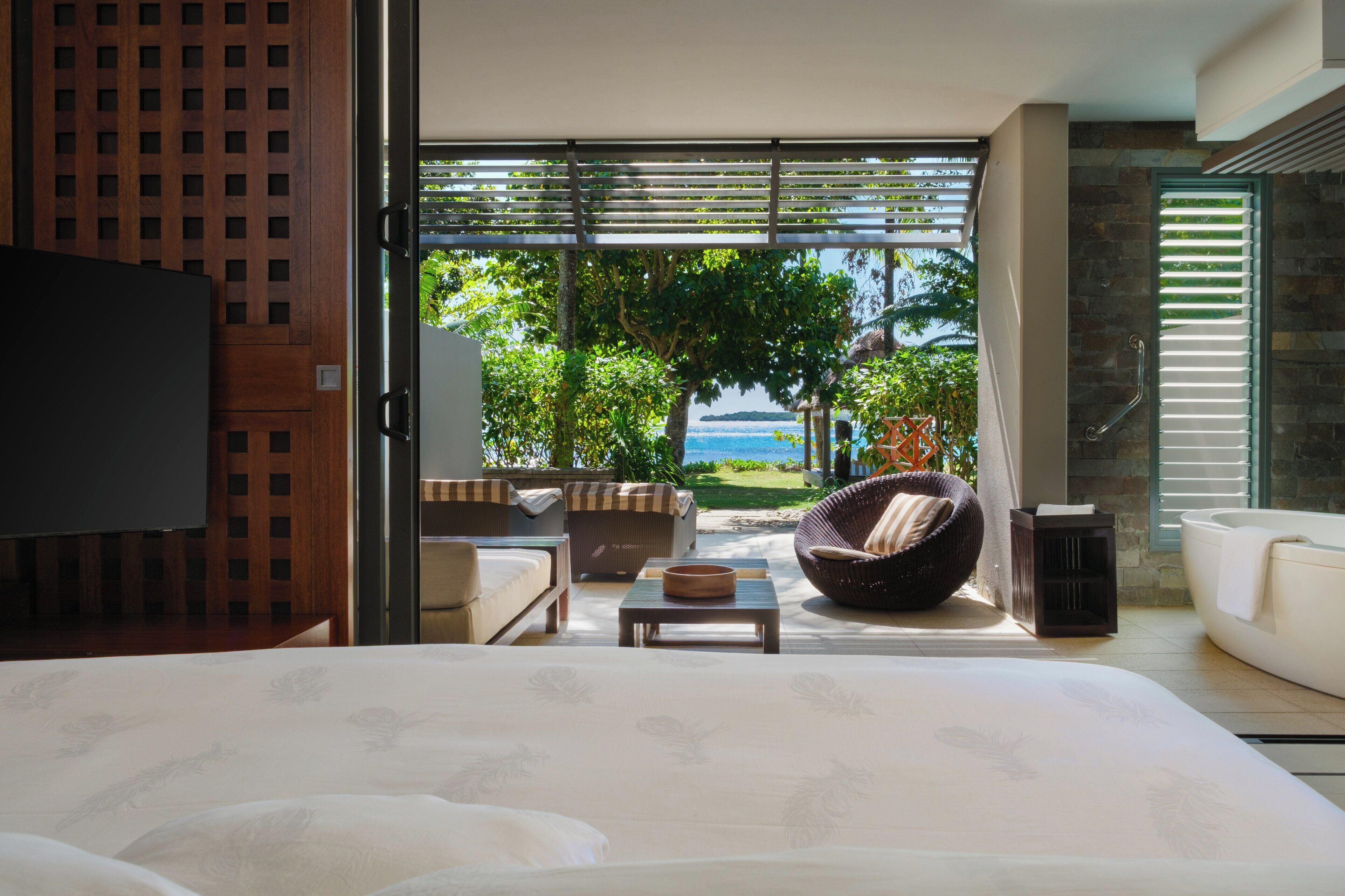 客房, 1 張特大雙人床, 地面層 (Beachfront) | 高級寢具、迷你吧、客房內保險箱、獨特裝潢