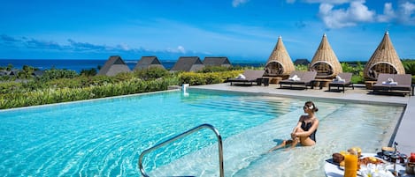3 outdoor pools, open 7:00 AM to 6:00 PM, free cabanas, pool umbrellas