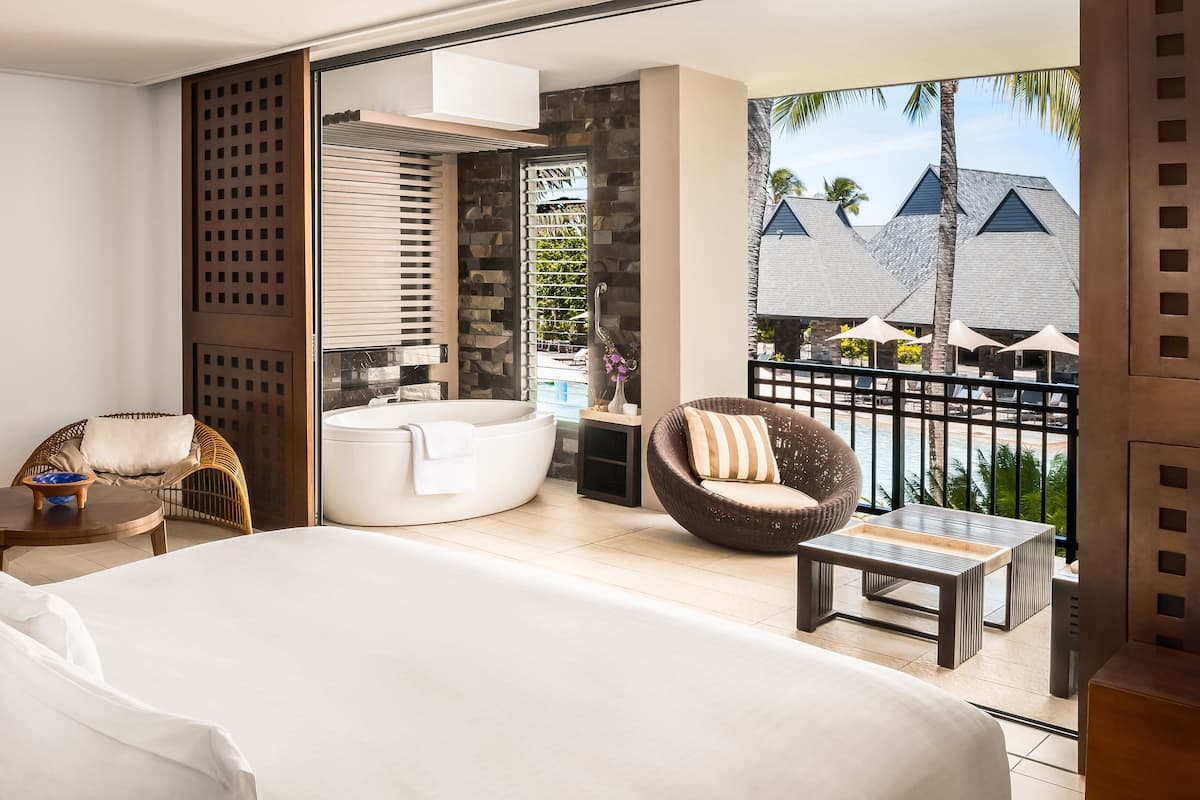 room, 1 king bed, balcony, pool view | 1 bedroom, premium bedding, minibar, in-room safe