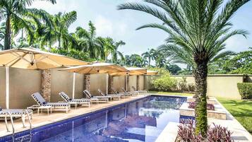 Outdoor pool, pool umbrellas, pool loungers