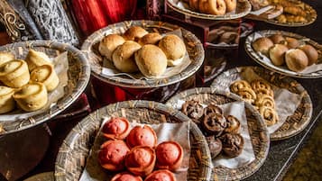 Daily buffet breakfast (USD 30 per person)