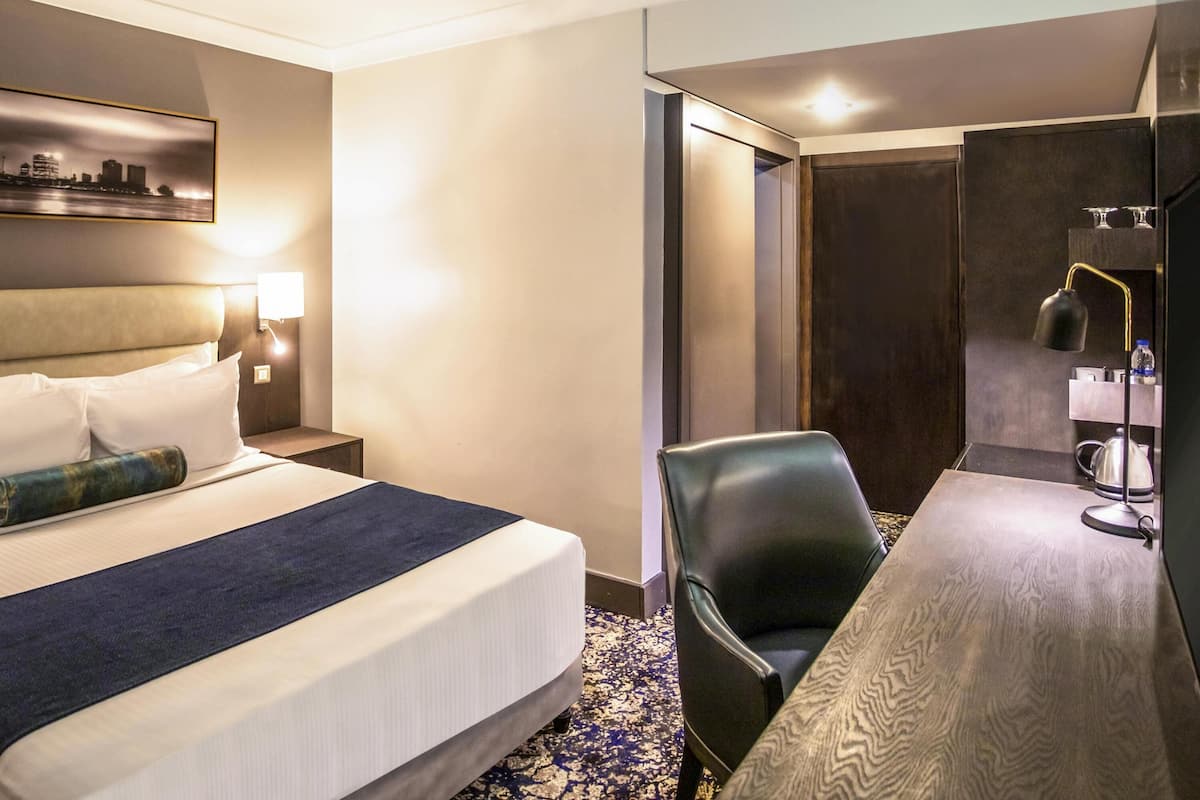 Chambre Deluxe, 1 trĂšs grand lit