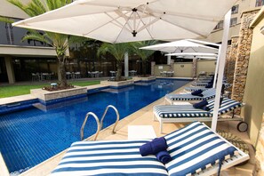 Outdoor pool, pool umbrellas, pool loungers