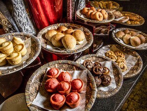 Daily buffet breakfast (USD 30 per person)