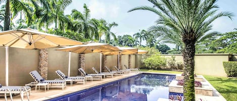 Outdoor pool, pool umbrellas, pool loungers