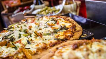 A pizza with various toppings.