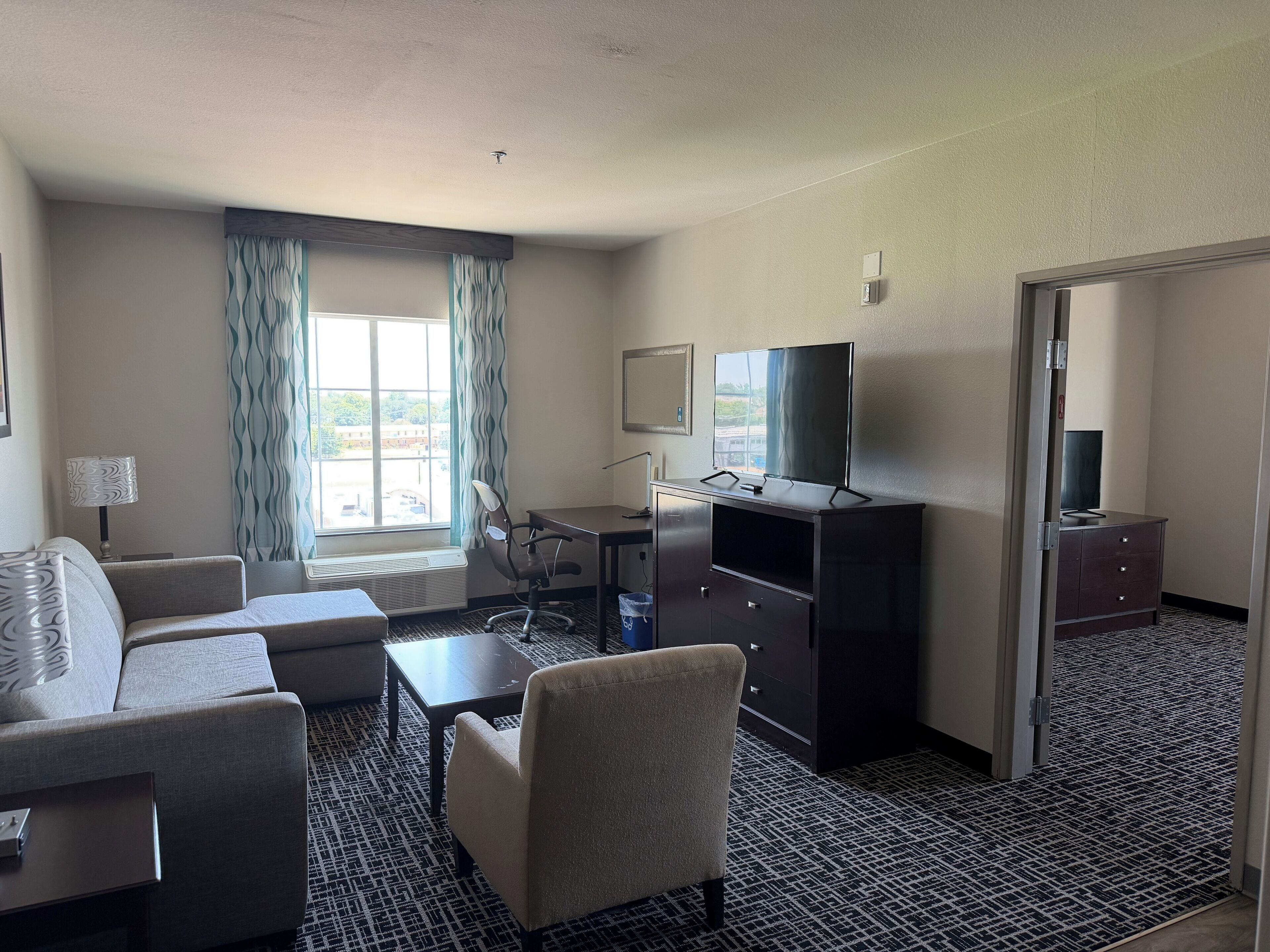 Deluxe Suite, 1 King Bed, Non Smoking (Mobility Accessible, Family) | Living area | Flat-screen TV