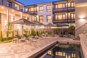 Outdoor pool, pool umbrellas, sun loungers