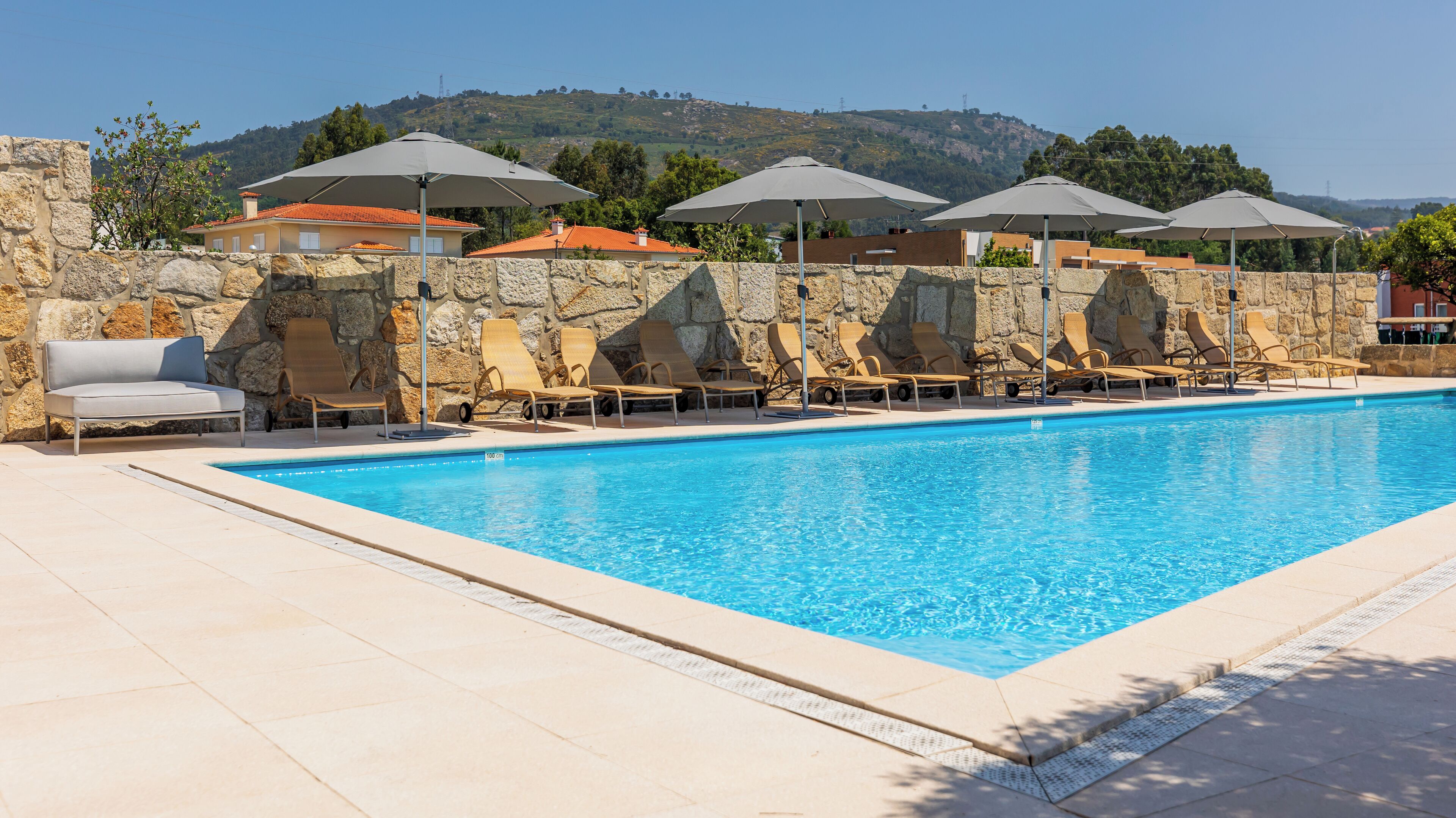 outdoor pool, open 8:30 am to 10 pm, pool loungers