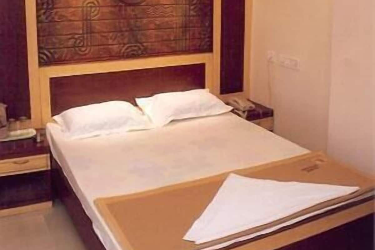 Minibar, desk, iron/ironing board