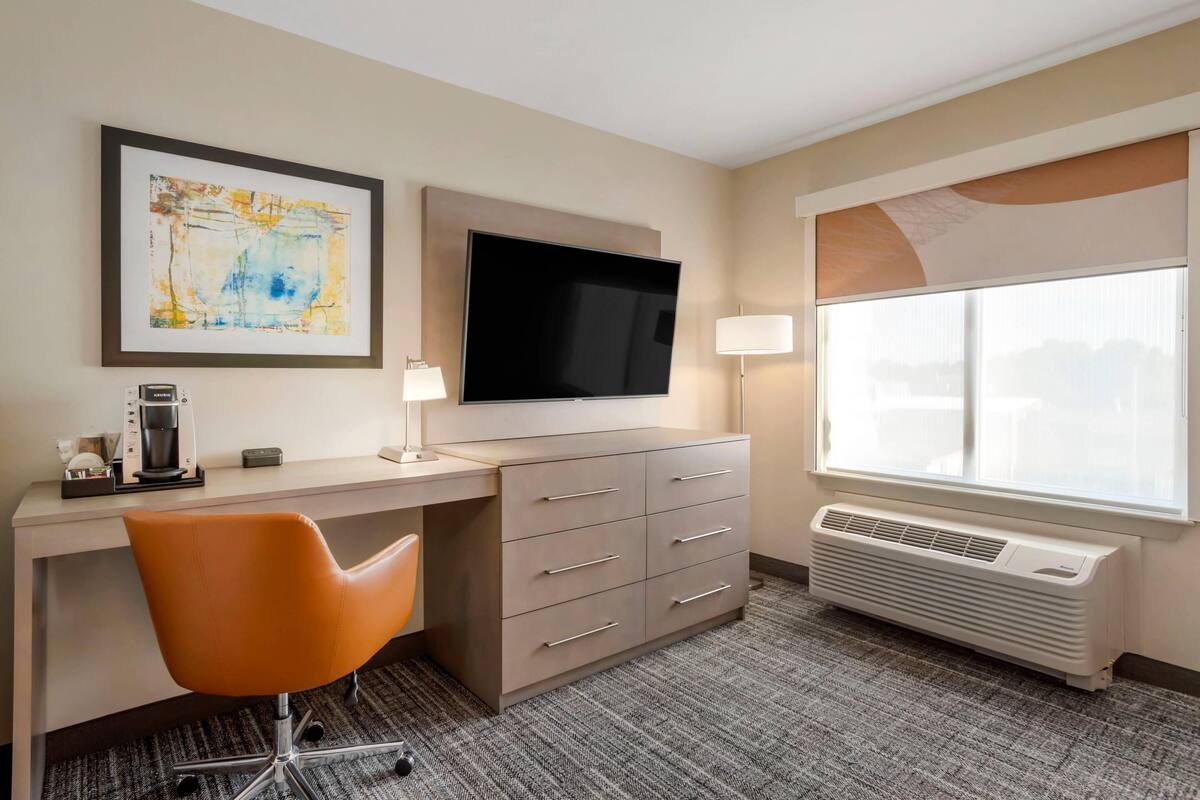 Pillowtop beds, desk, blackout drapes, iron/ironing board