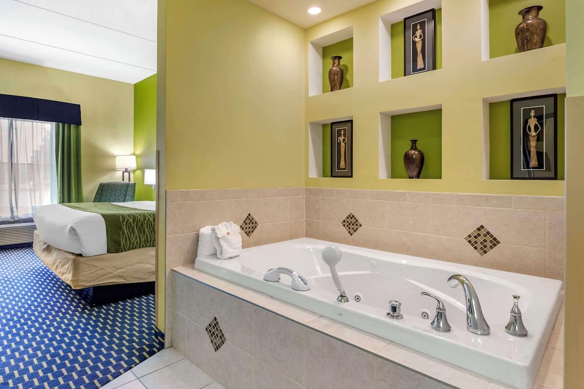 suite, 1 king bed, non smoking | desk, laptop workspace, iron/ironing board, free wifi