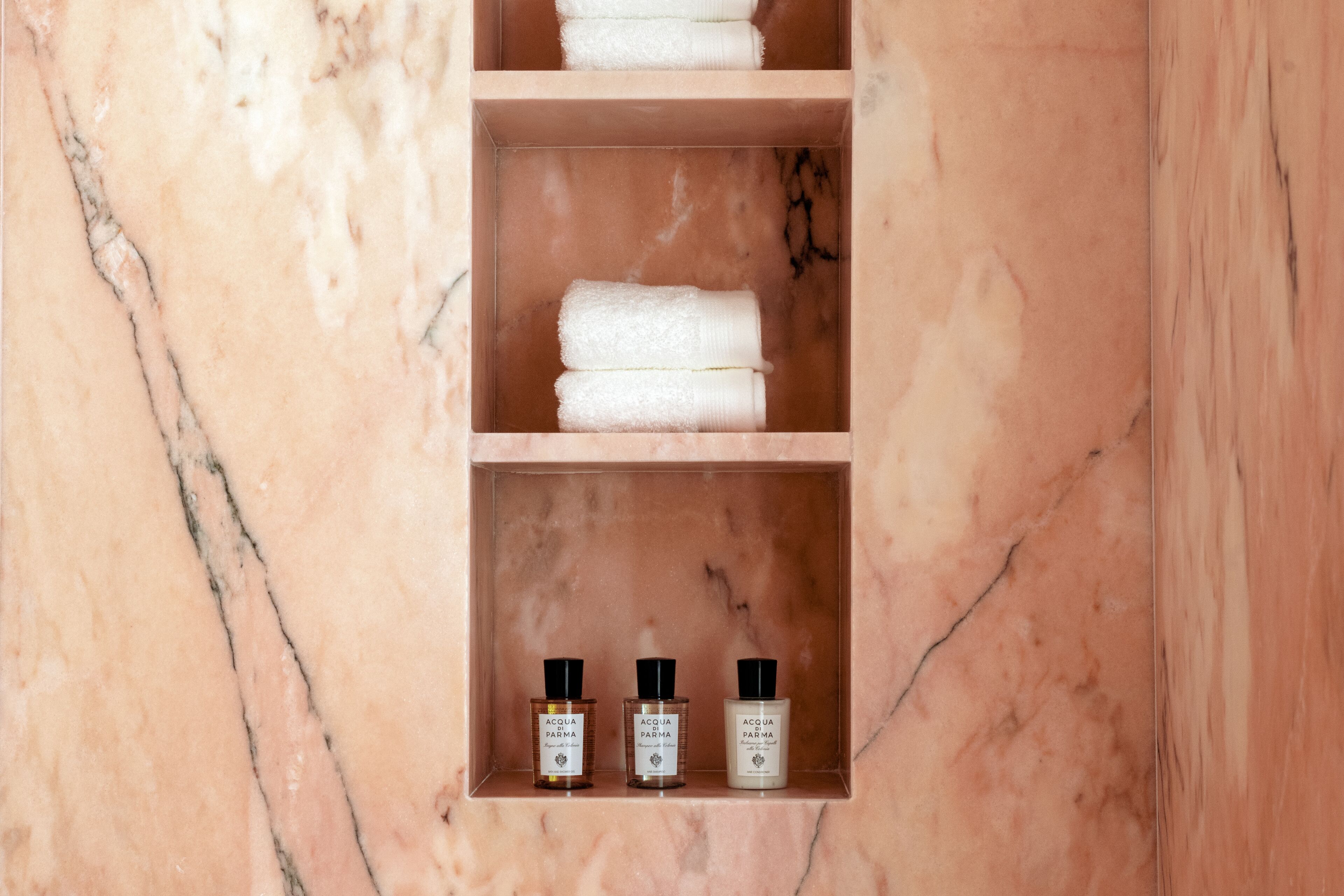 rainfall showerhead, designer toiletries, hair dryer, bathrobes