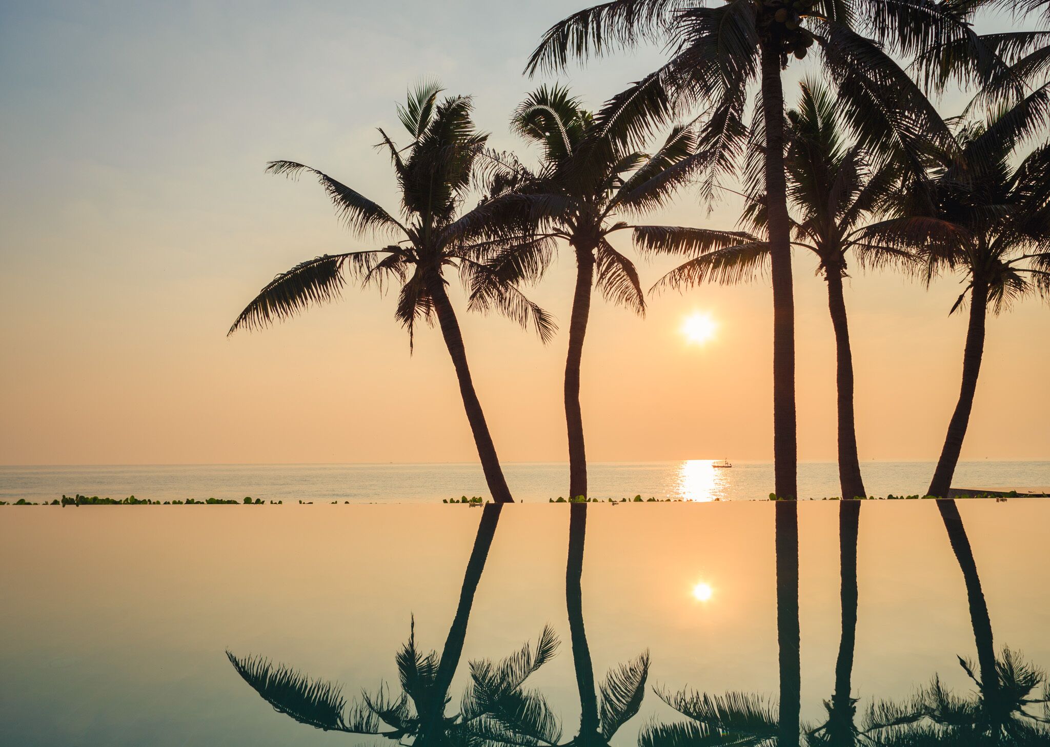 private beach, white sand, beach umbrellas, beach towels