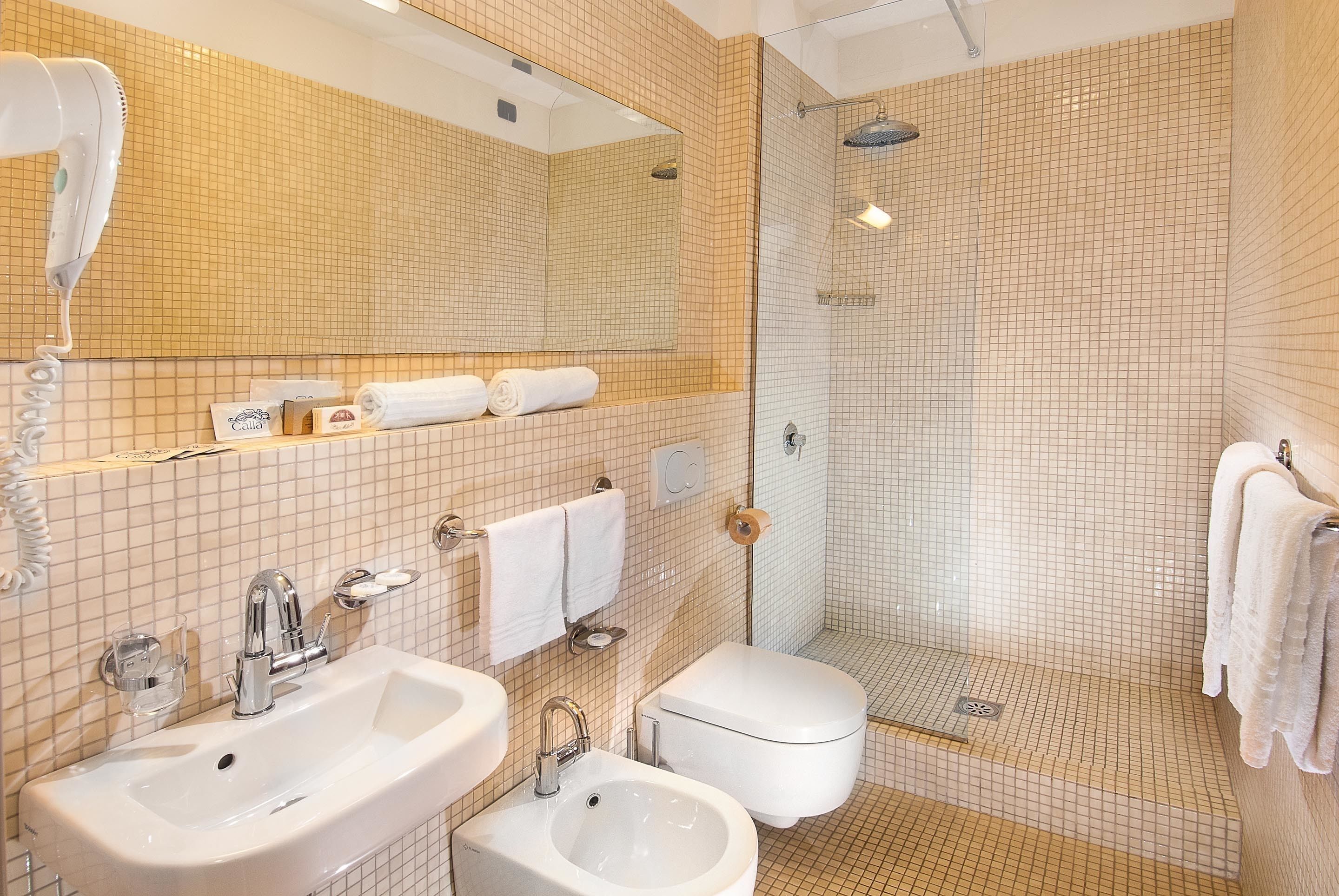 free toiletries, hair dryer, bidet, towels