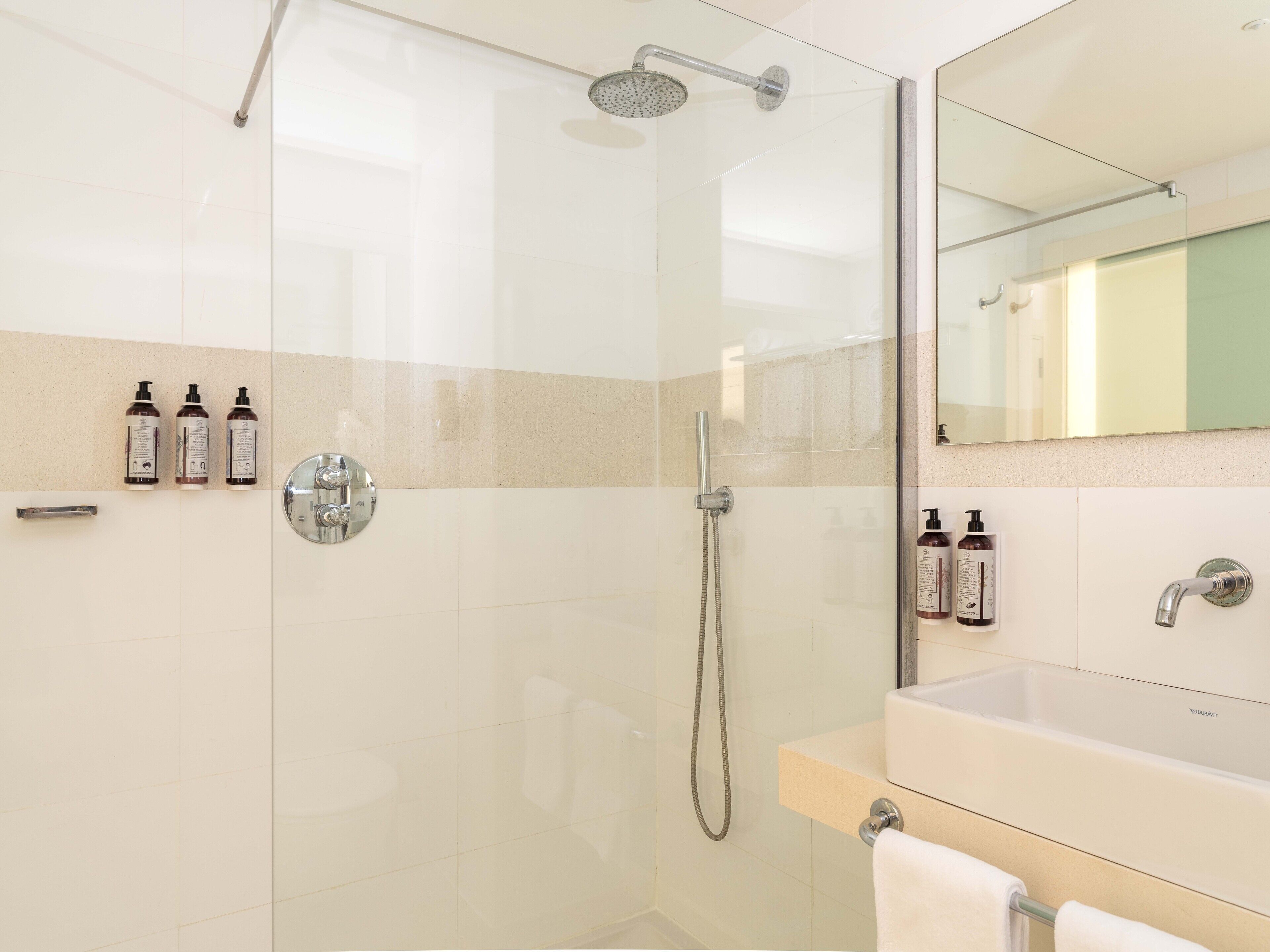 premium double room (sharing pool) | bathroom | shower, rainfall showerhead, eco-friendly toiletries, hair dryer