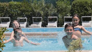 Outdoor pool, pool umbrellas, sun loungers