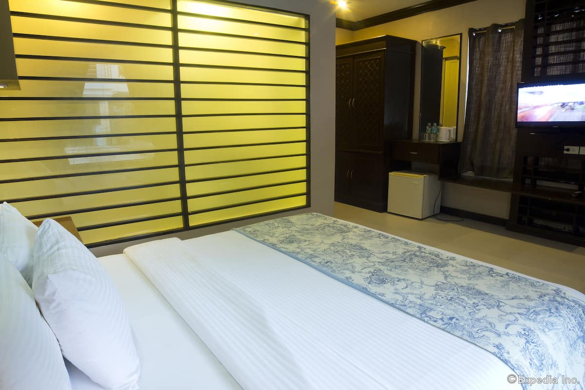 Deluxe kamer | Een kluis op de kamer, babybedden (toeslag), extra bedden (toeslag)