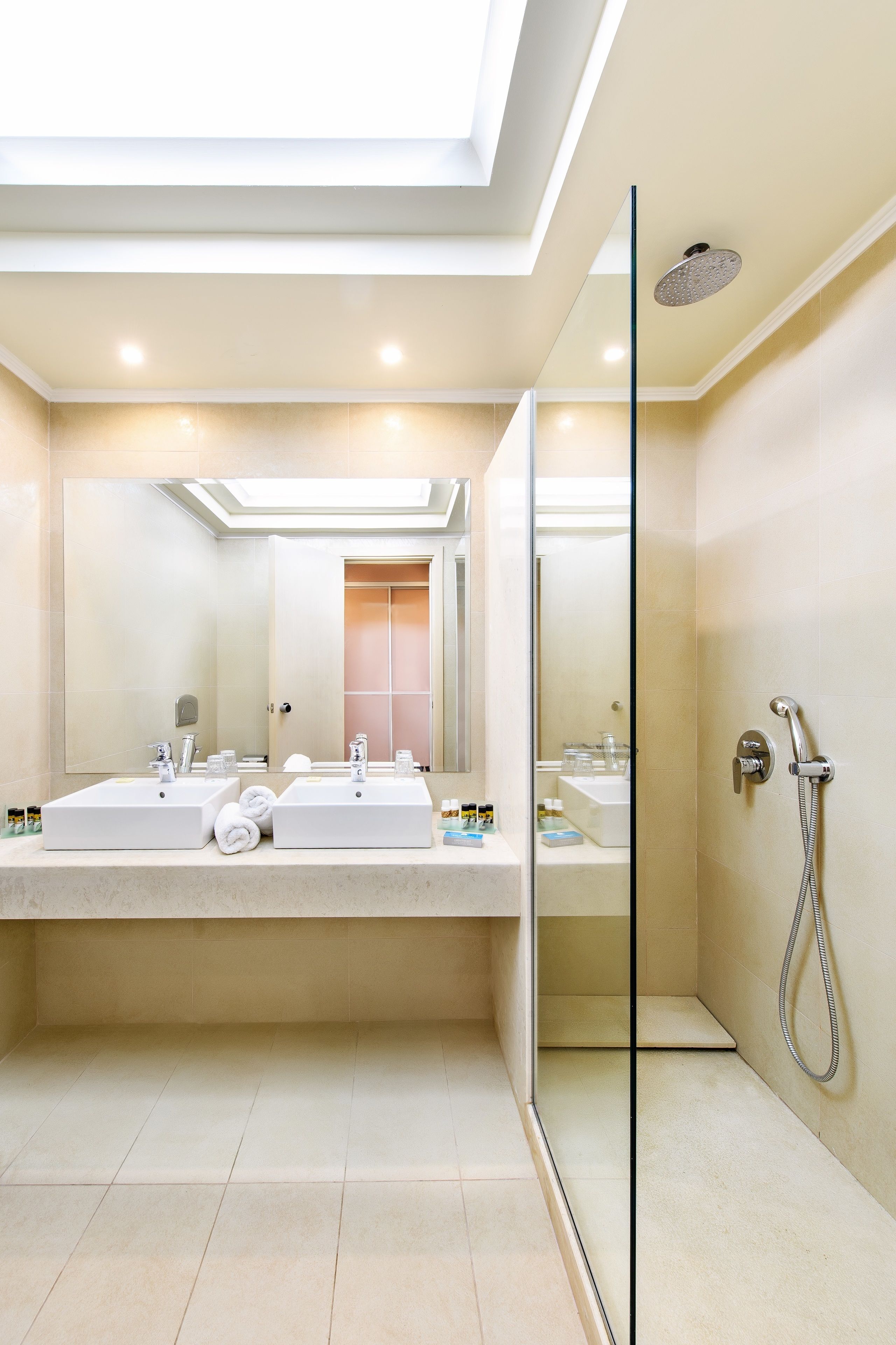 eco-friendly toiletries, hair dryer, slippers, towels