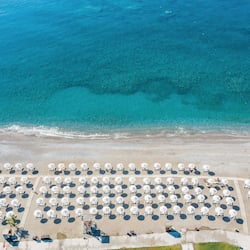On the beach, black sand, free beach shuttle, sun-loungers