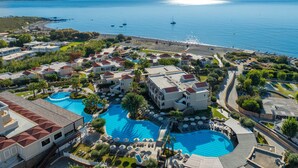 A resort with multiple swimming pools, beachfront access, and a variety of building styles. - Lindos Imperial Resort & Spa (Rhodes)