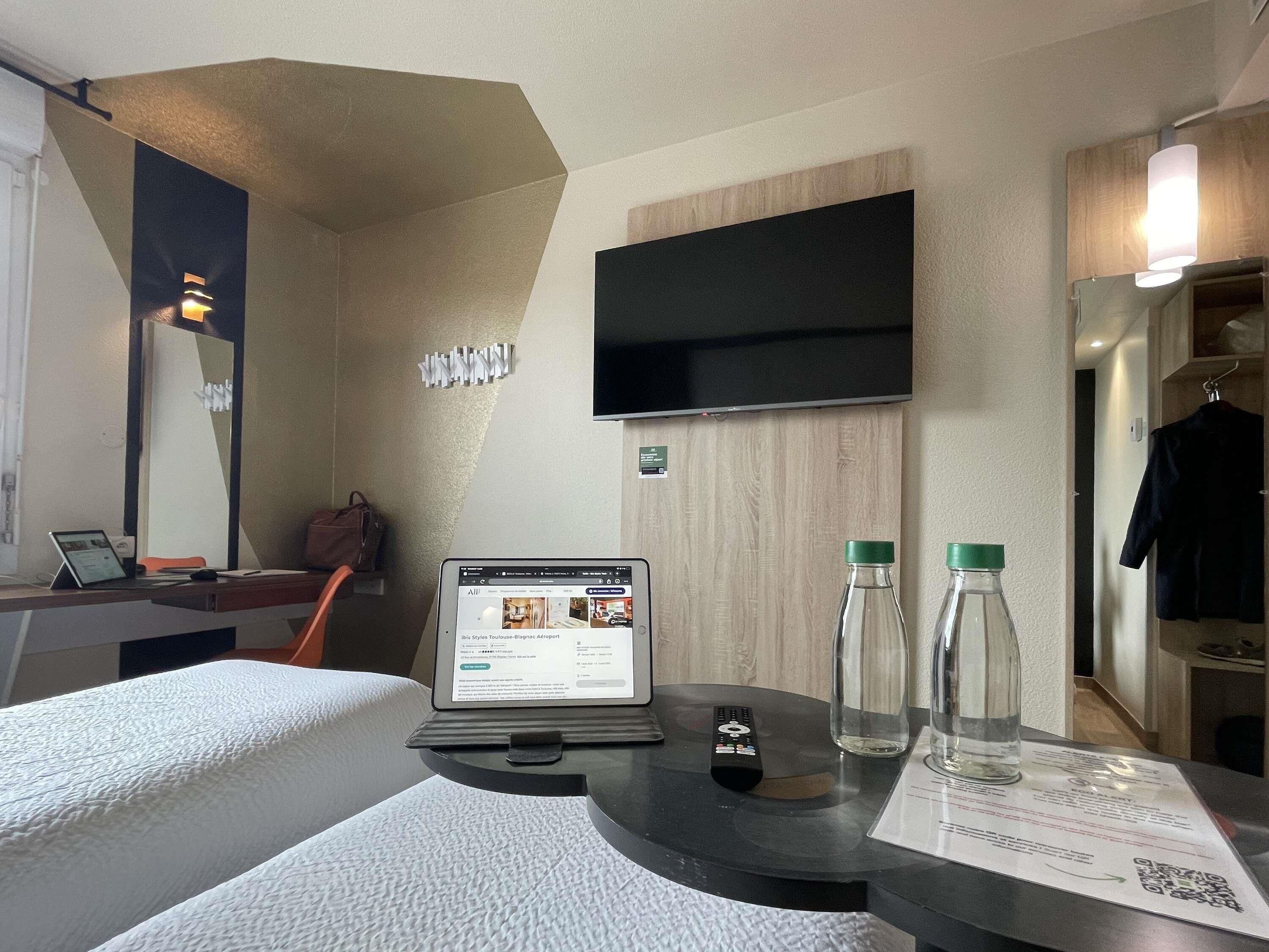 Premium bedding, pillowtop beds, desk, laptop workspace