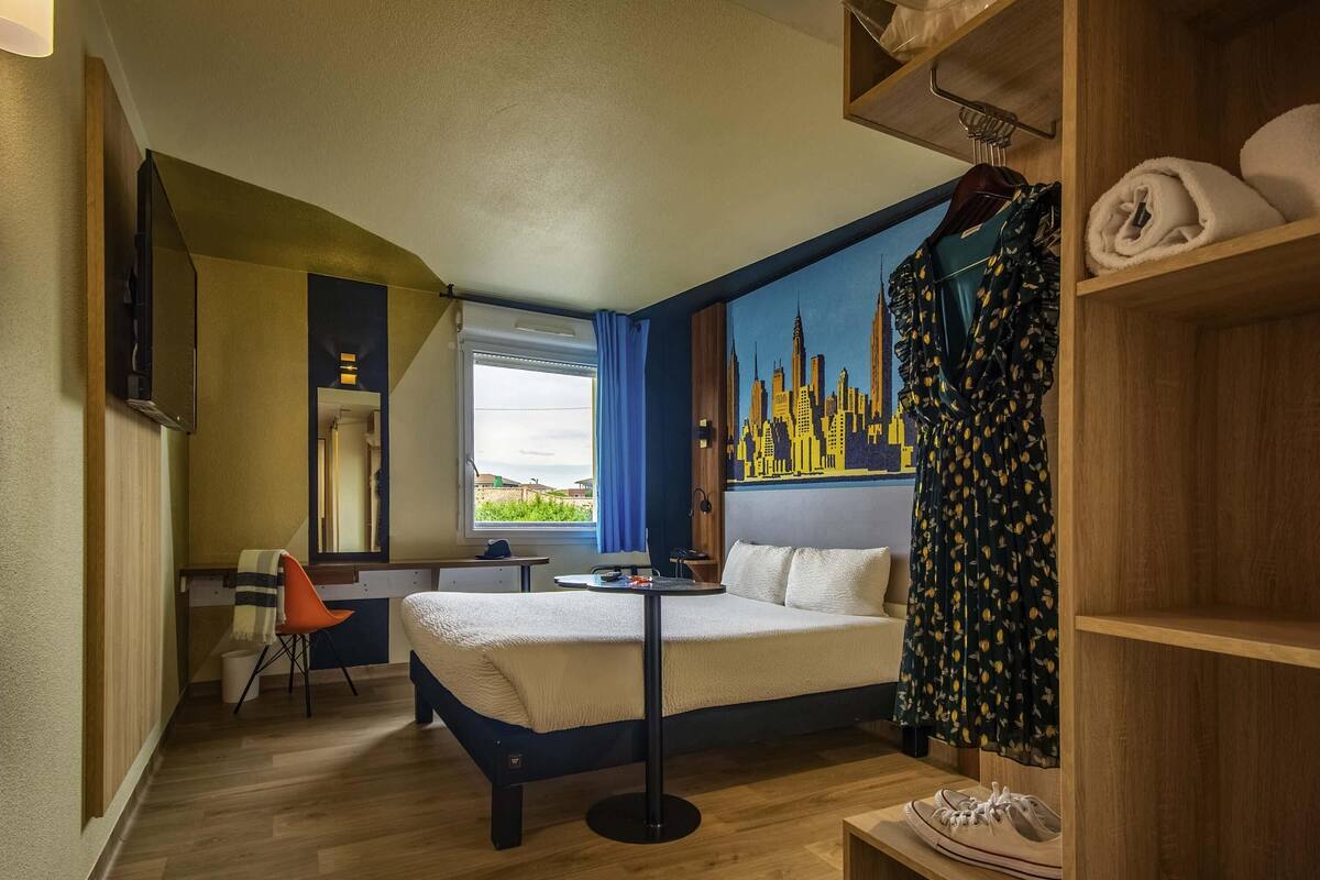 Premium bedding, pillow-top beds, desk, laptop workspace