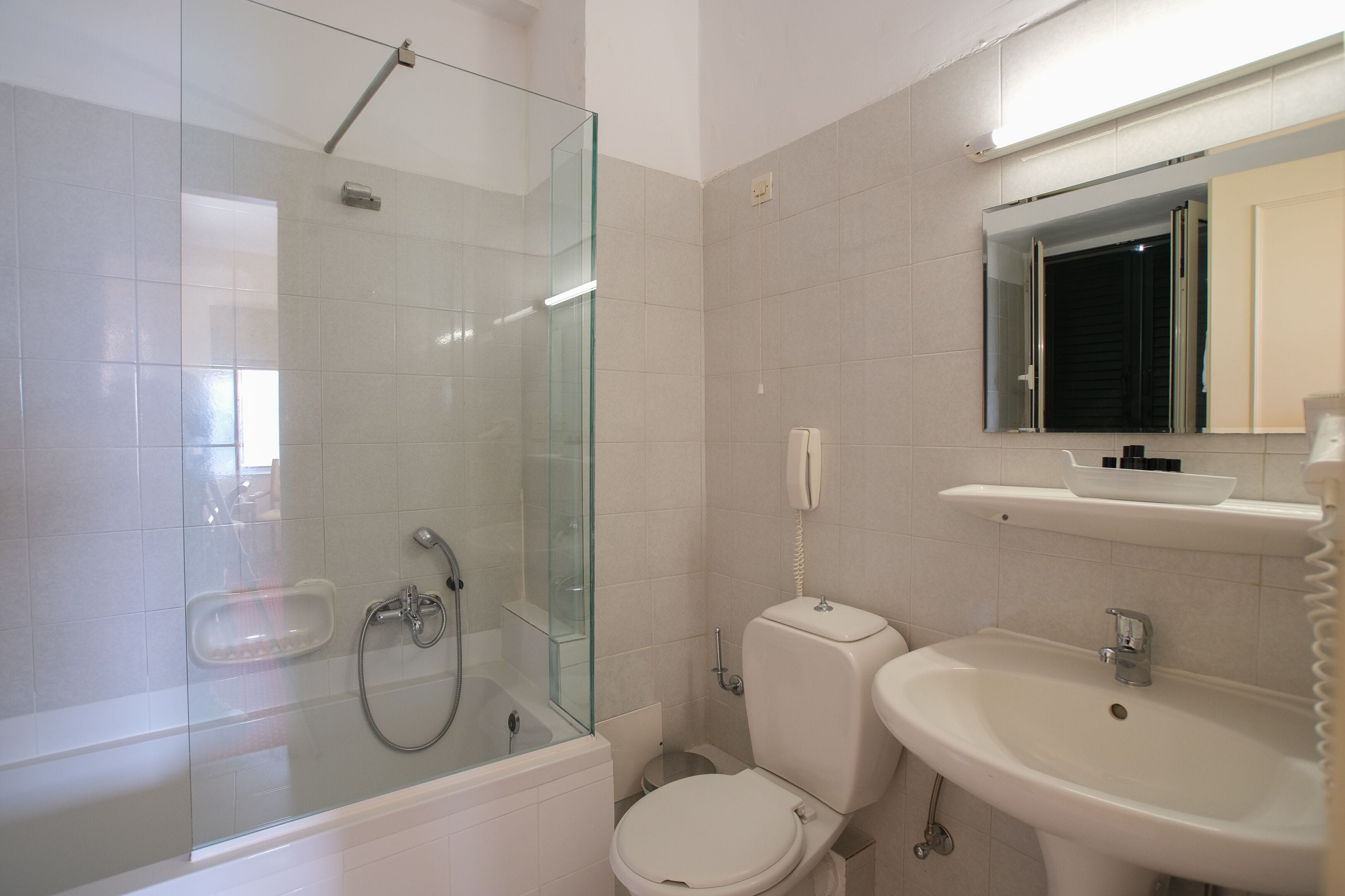 free toiletries, hair dryer, slippers, towels