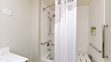 Combined shower/tub, rainfall showerhead, free toiletries, hair dryer