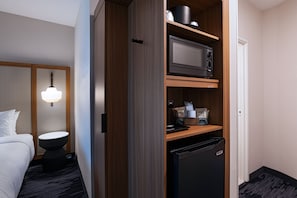 Premium bedding, desk, laptop workspace, iron/ironing board