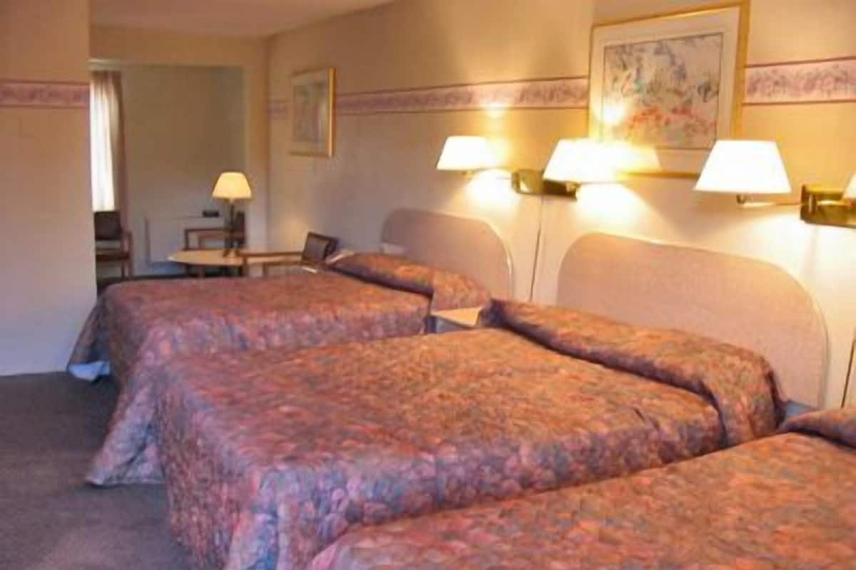 Family Room | Premium bedding, pillowtop beds, individually decorated
