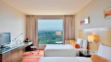 Hypo-allergenic bedding, memory-foam beds, minibar, in-room safe