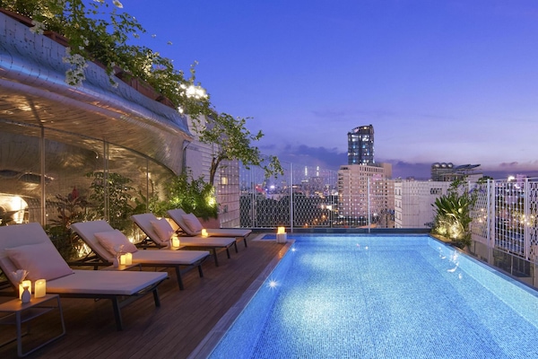 Outdoor pool, open 6:30 AM to 6:00 PM, pool loungers