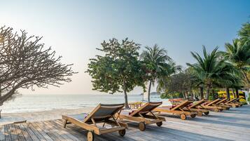 Private beach, beach umbrellas, beach towels, kayaking