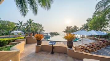 Outdoor pool, pool umbrellas, pool loungers
