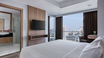 Executive Suite, 1 Bedroom, City View | In-room safe, desk, laptop workspace, blackout drapes
