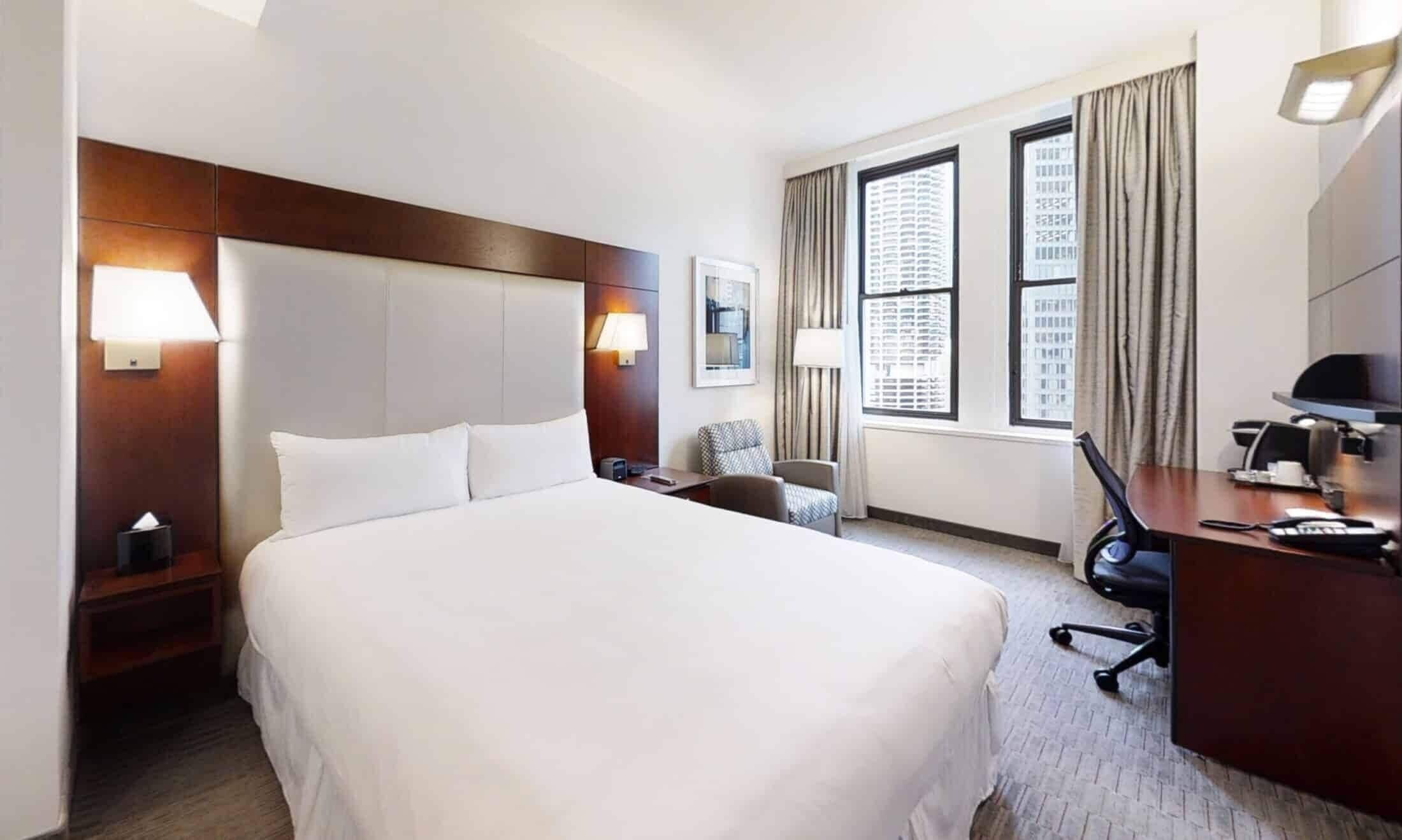 Premium bedding, desk, laptop workspace, free WiFi