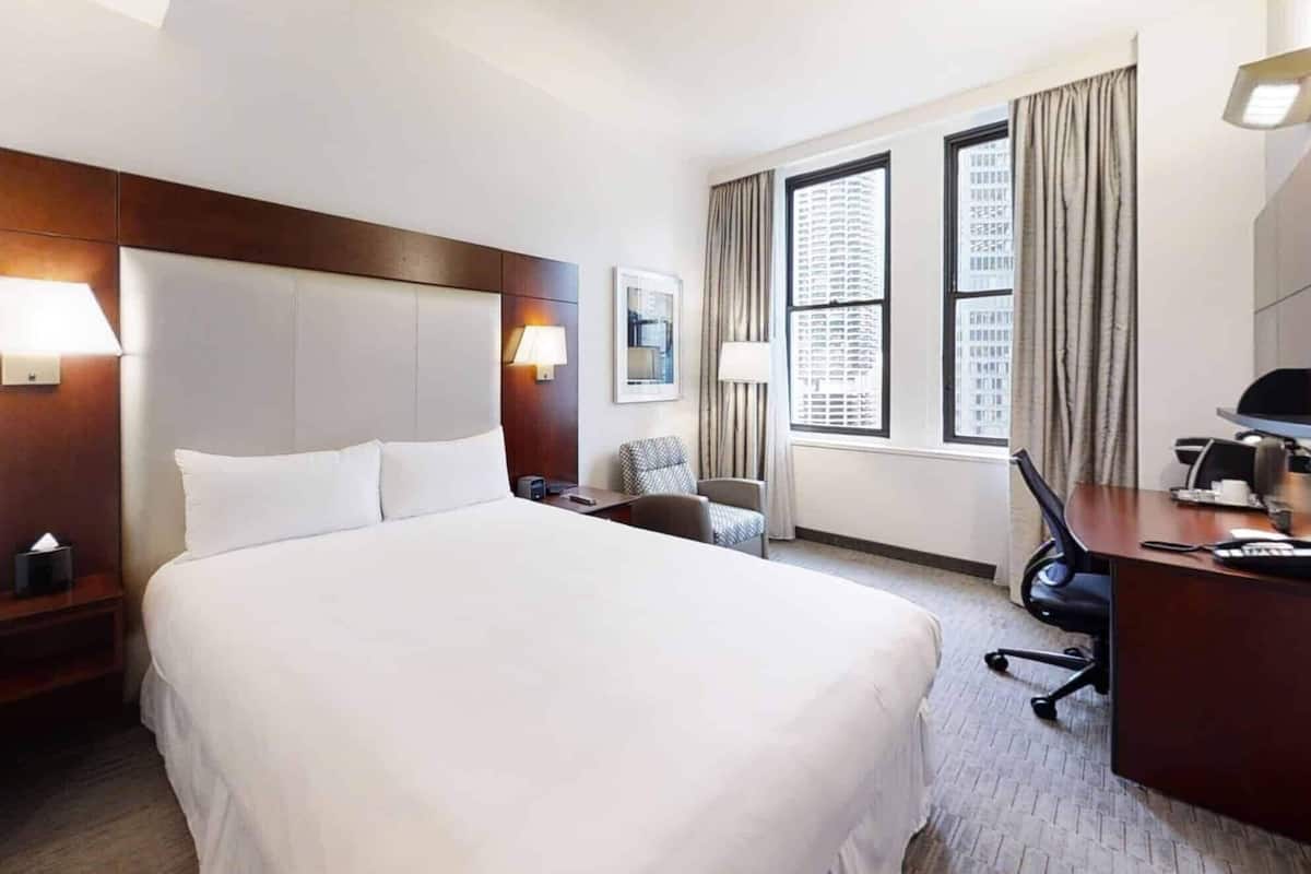 Premium bedding, desk, laptop workspace, free WiFi