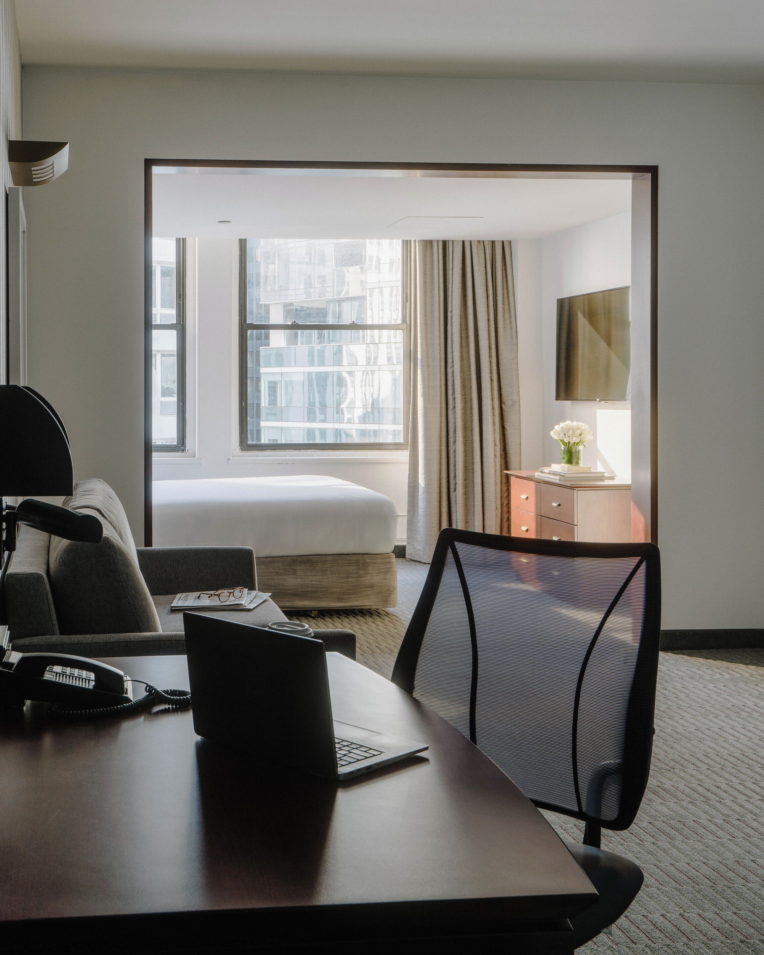 Premium bedding, desk, laptop workspace, WiFi (free)
