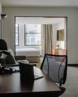 Premium bedding, desk, laptop workspace, free WiFi