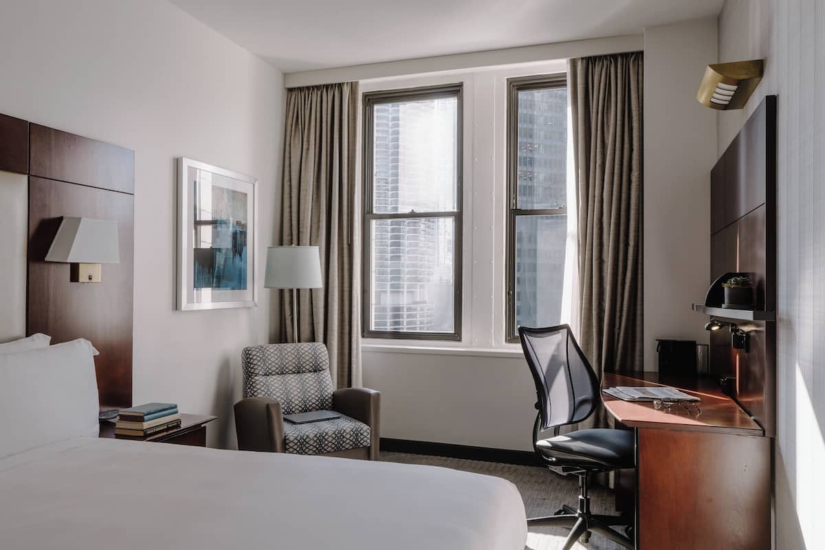 Premium bedding, desk, laptop workspace, free WiFi