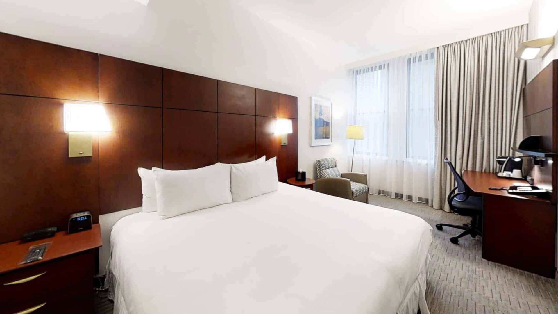 Premium bedding, desk, laptop workspace, free WiFi