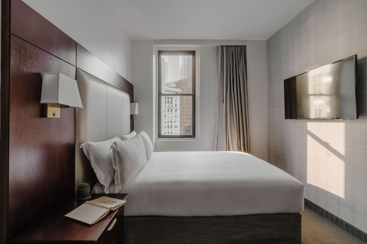 Premium bedding, desk, laptop workspace, free WiFi