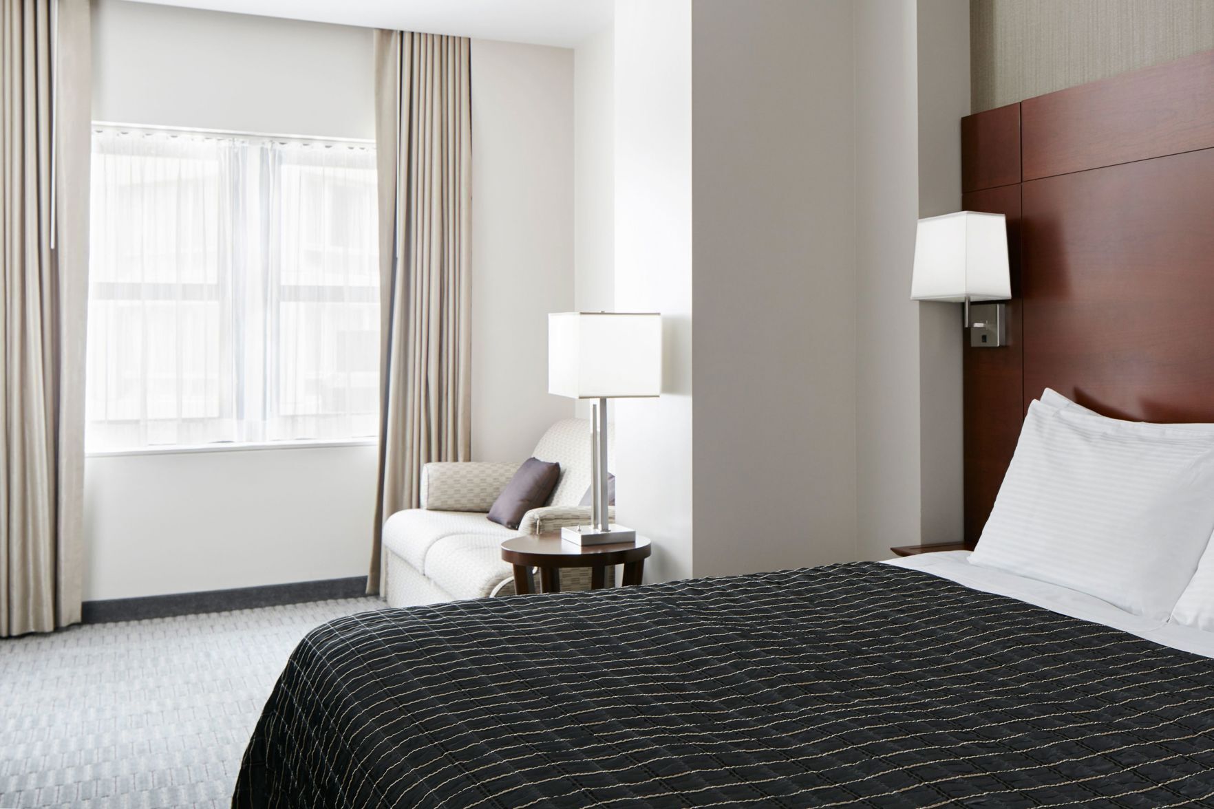 Premium bedding, desk, laptop workspace, free WiFi