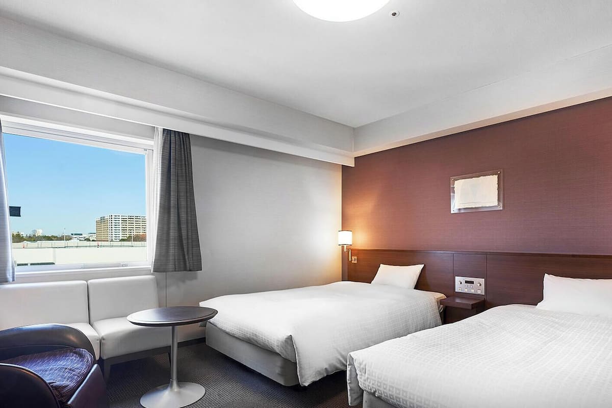 Desk, blackout drapes, WiFi (free), bed sheets
