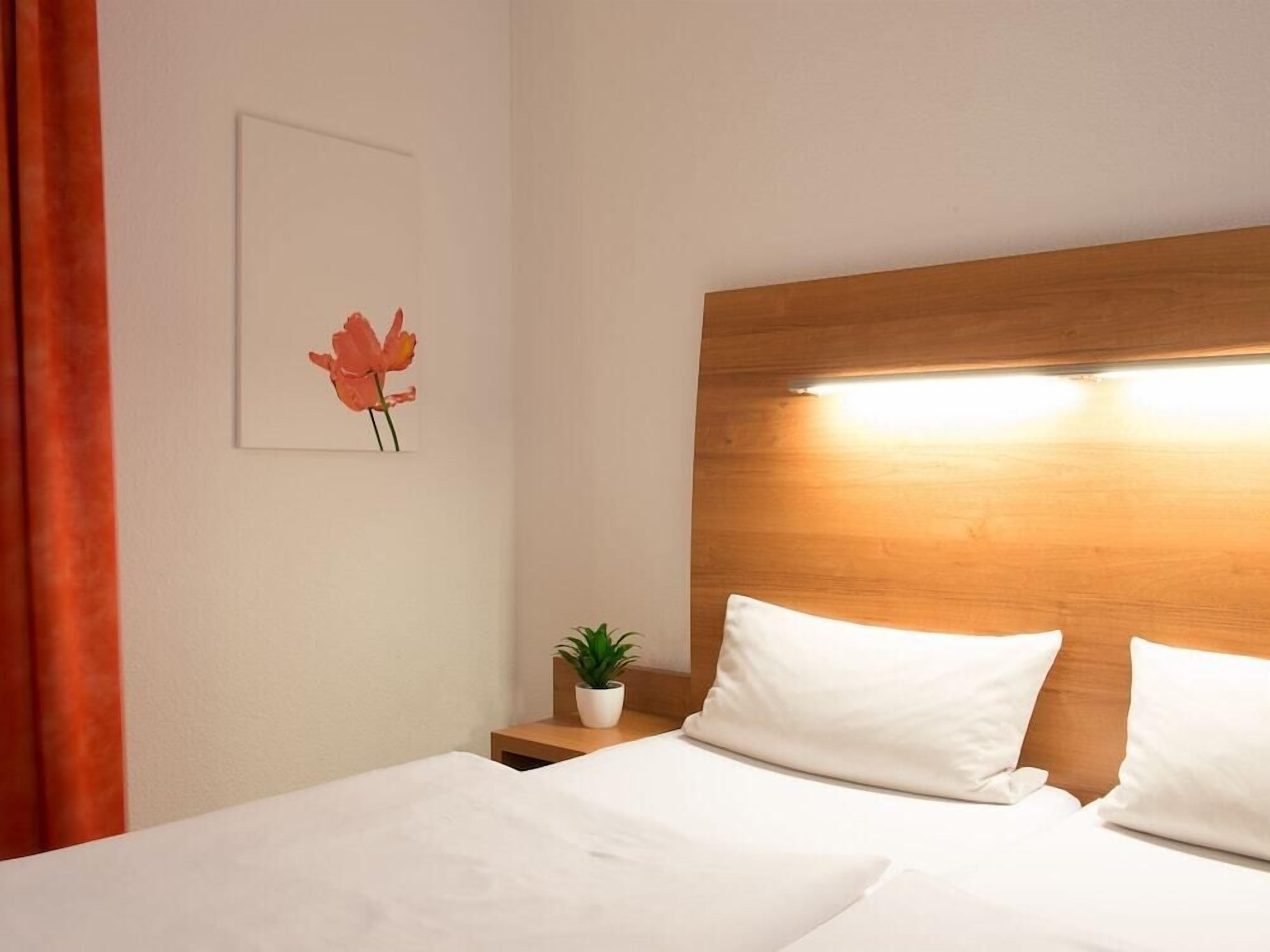 hypo-allergenic bedding, in-room safe, desk, blackout curtains